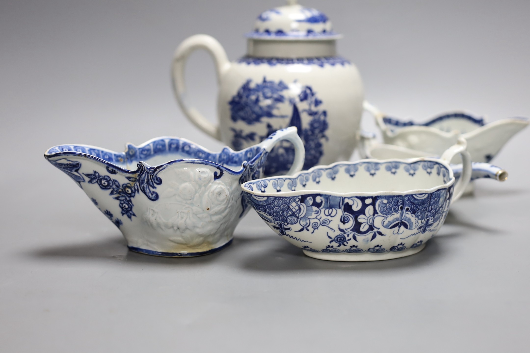 Two Worcester blue and white sauceboats a Bow (?) Sauceboat, a damaged teapot and a continental invalid feeder